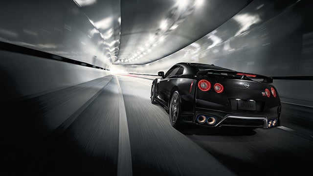 2023 Nissan GT-R seen from behind driving through a tunnel | Vann York's High Point Nissan in High Point NC